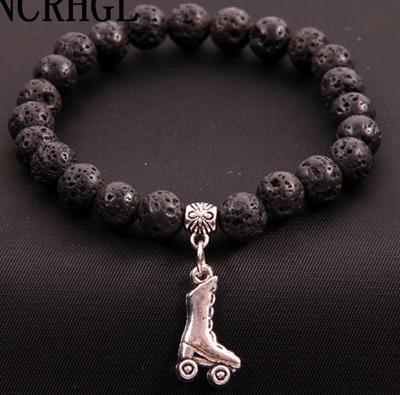 Pulseras perlas negras con patin outlet patin patinaje artistico