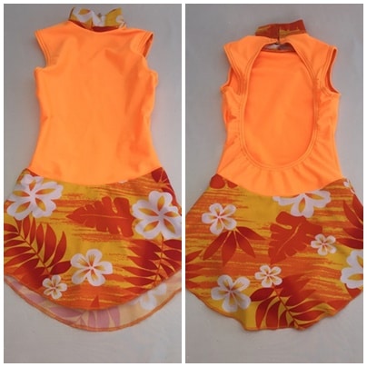 Traje naranja falda estampada
